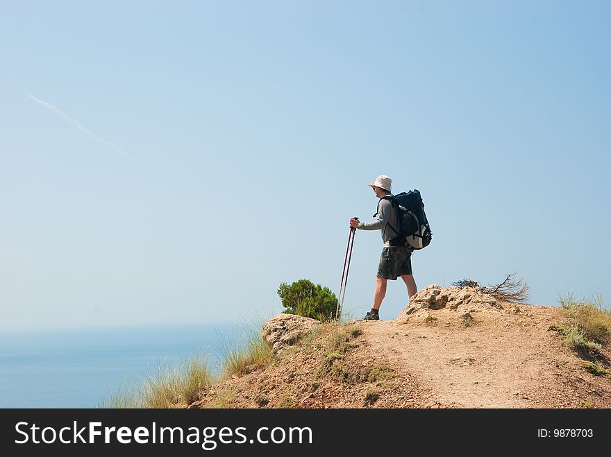 Hiker On A Peak