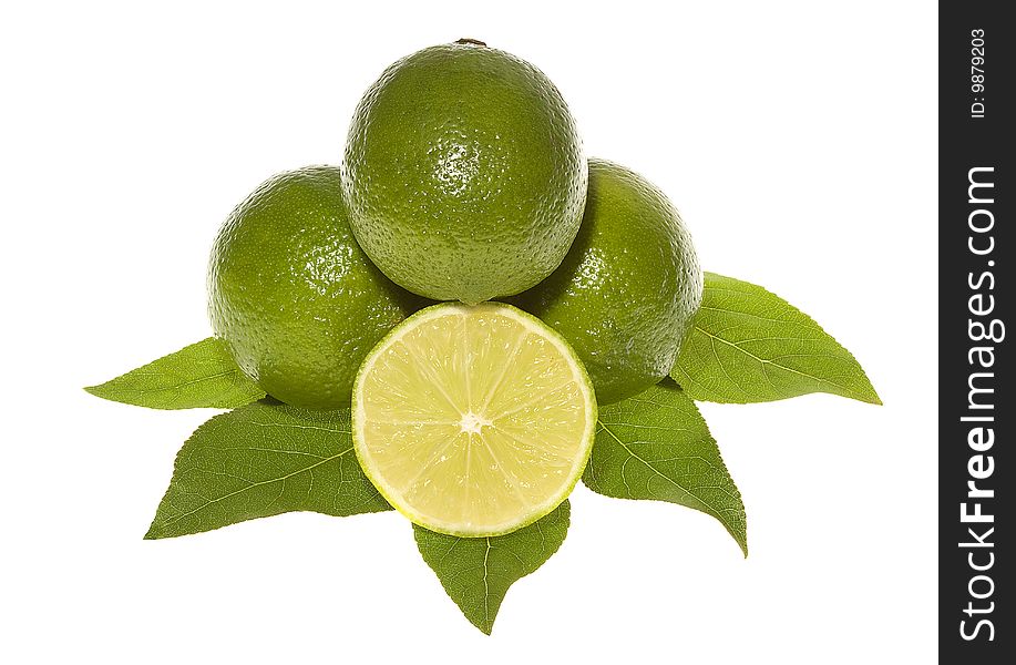 Limes with leafs on white background