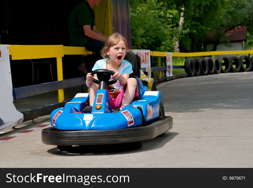 Girl is driving bumper car