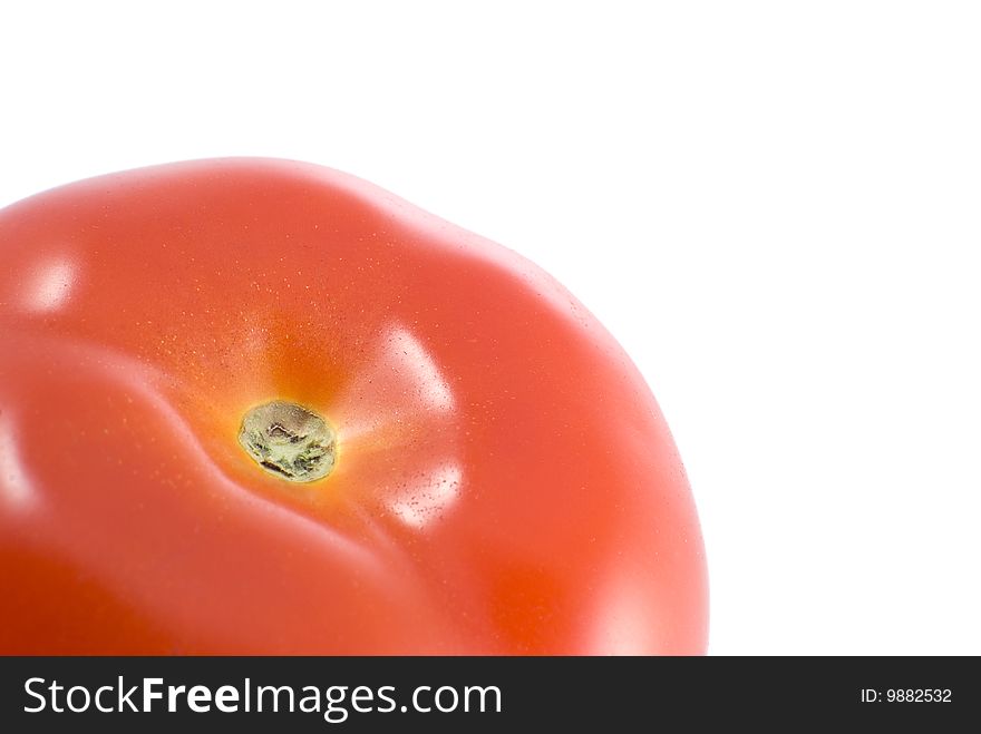 Part of a tomato isolated against a white background.