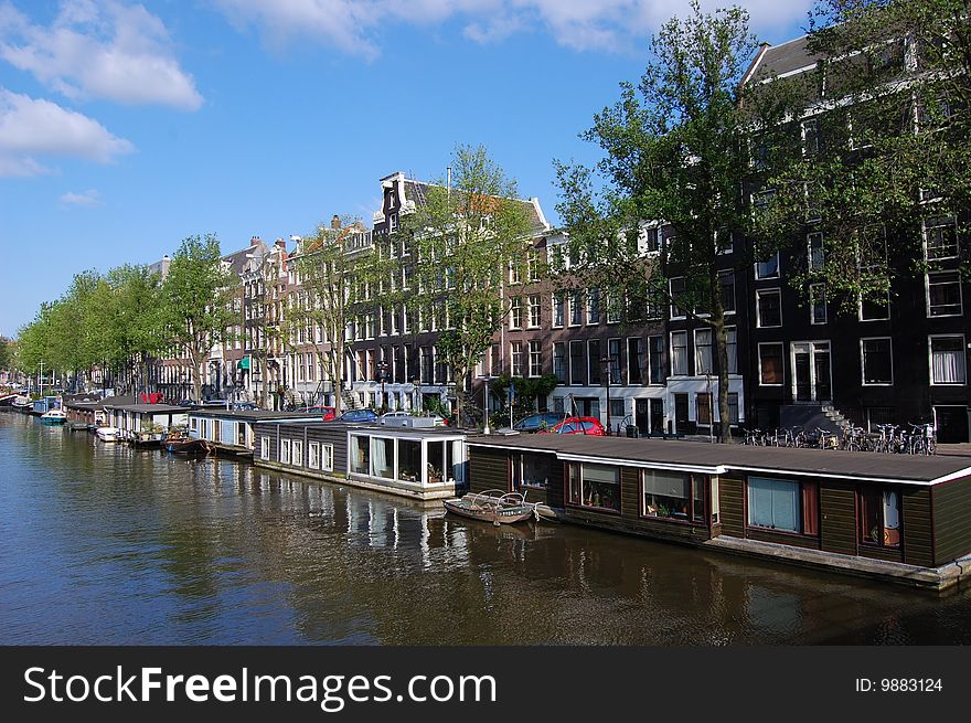 Amsterdam canal houses Together with some houseboats.