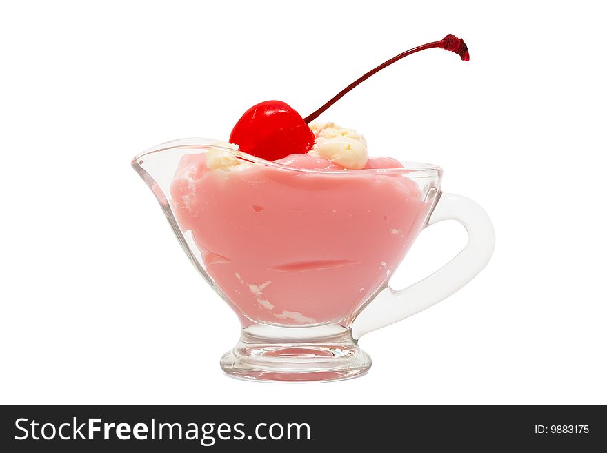 Sweet dessert with a cherry on a white background