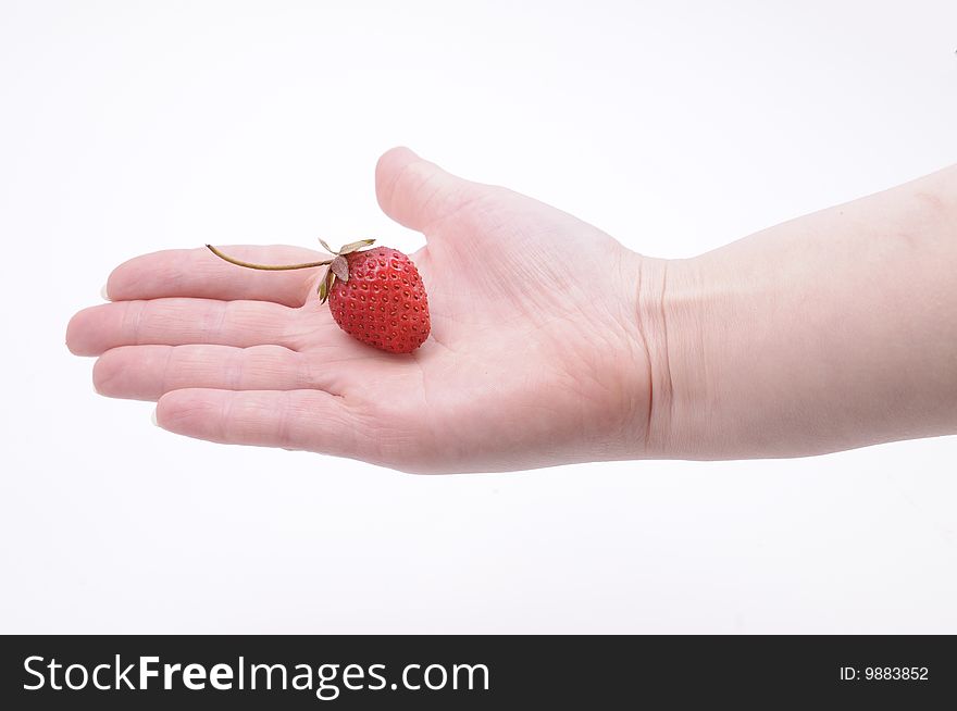Hand with strawberry isolated on white background. Hand with strawberry isolated on white background
