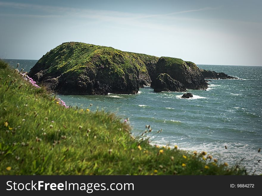 Typical Irish landscape - cliffs over the sea, co.Waterford. Typical Irish landscape - cliffs over the sea, co.Waterford