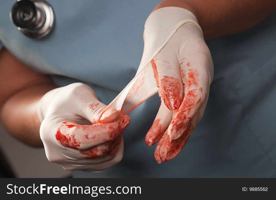 Abstract Of Doctors Bloody Surgical Gloves
