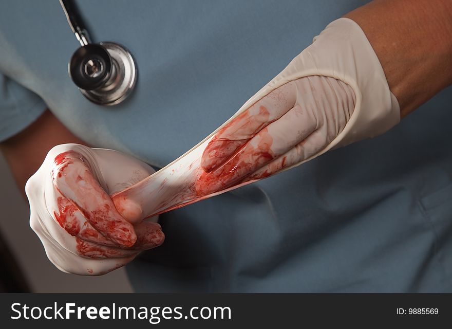Abstract Of Doctors Bloody Surgical Gloves