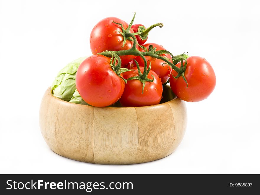 Fresh vegetables on the bowl isolated on white background