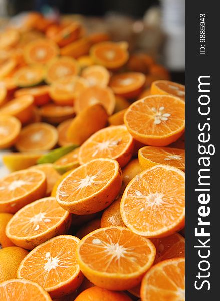 Fresh orange halves found at a fresh fruit market in Bangkok, thailand