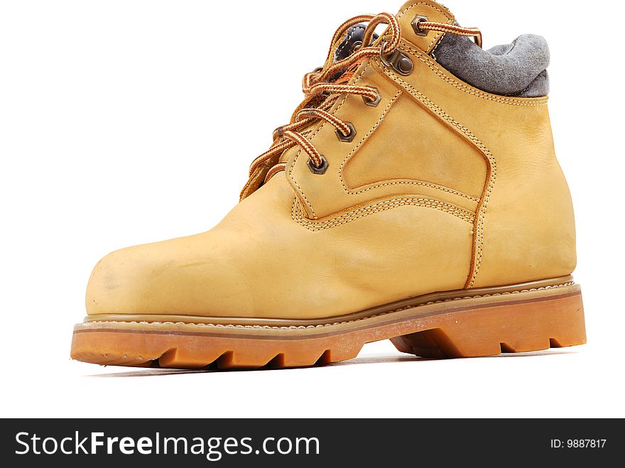 Yellow boots on a thick sole for heavy work and walks.