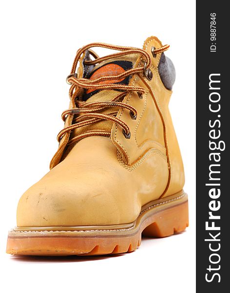 Yellow boots on a thick sole for heavy work and walks.