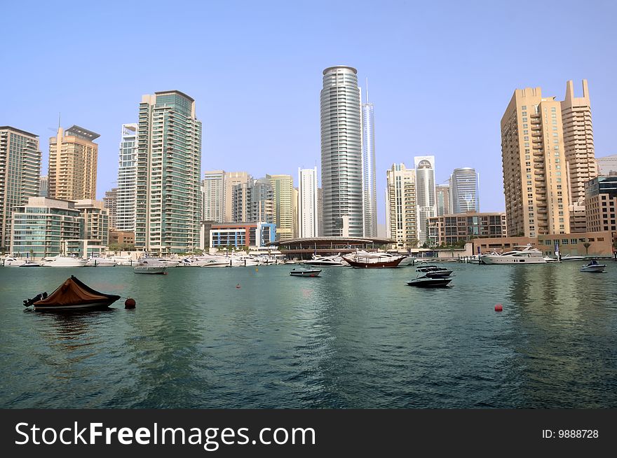 A landscape view of residential towers against Dubai Marina. A landscape view of residential towers against Dubai Marina