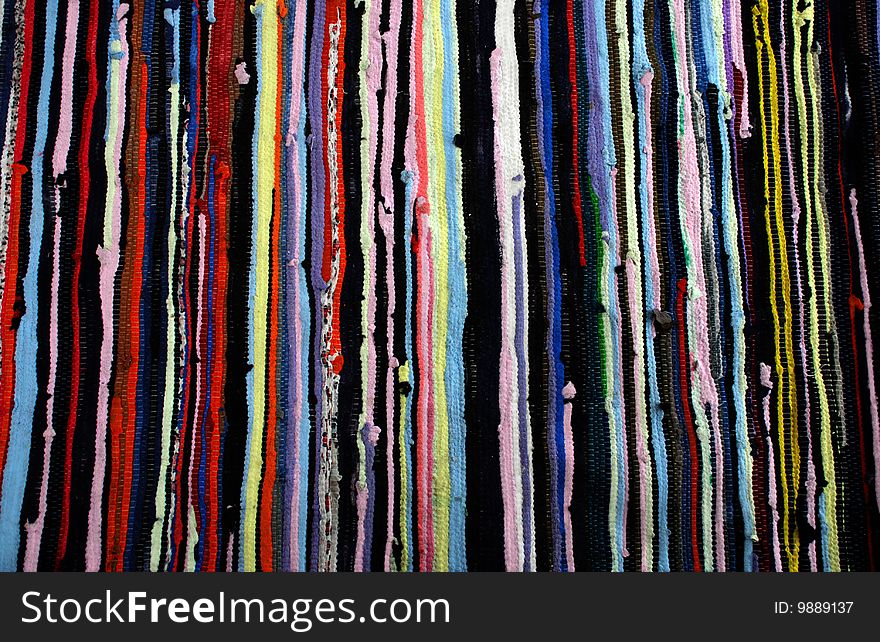 Handmade oriental varicolored striped carpet