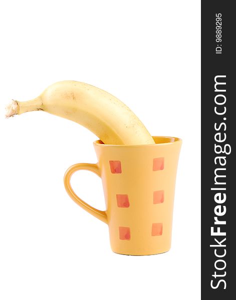 Yellow banana in a cup