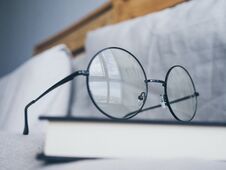 Eyeglasses And Book In Bedroom For Reading And Relax. Royalty Free Stock Image Eyeglasses And Book In Bedroom For Reading And Relax. Royalty Free Stock Image