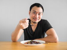 Man Eats Healthy Food. Stock Images Man Eats Healthy Food. Stock Images