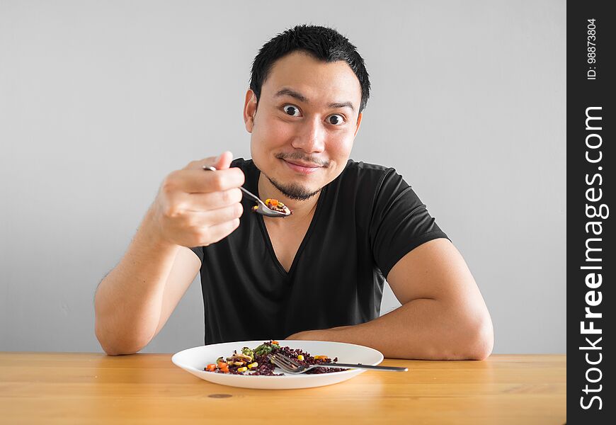 Asian man eats clean food for good healthy life. Asian man eats clean food for good healthy life.