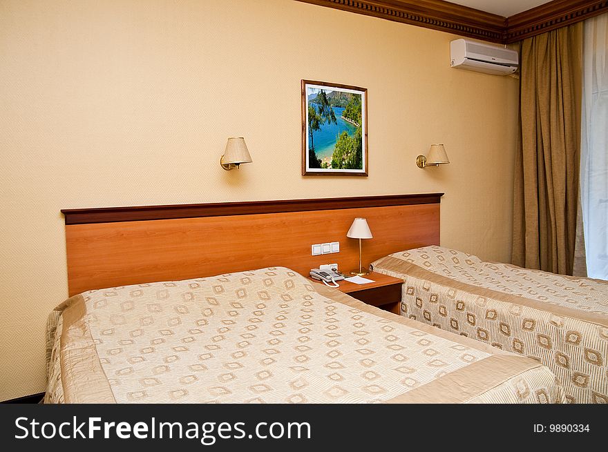 Sleeping room in a hotel Photograph on the wall made by author