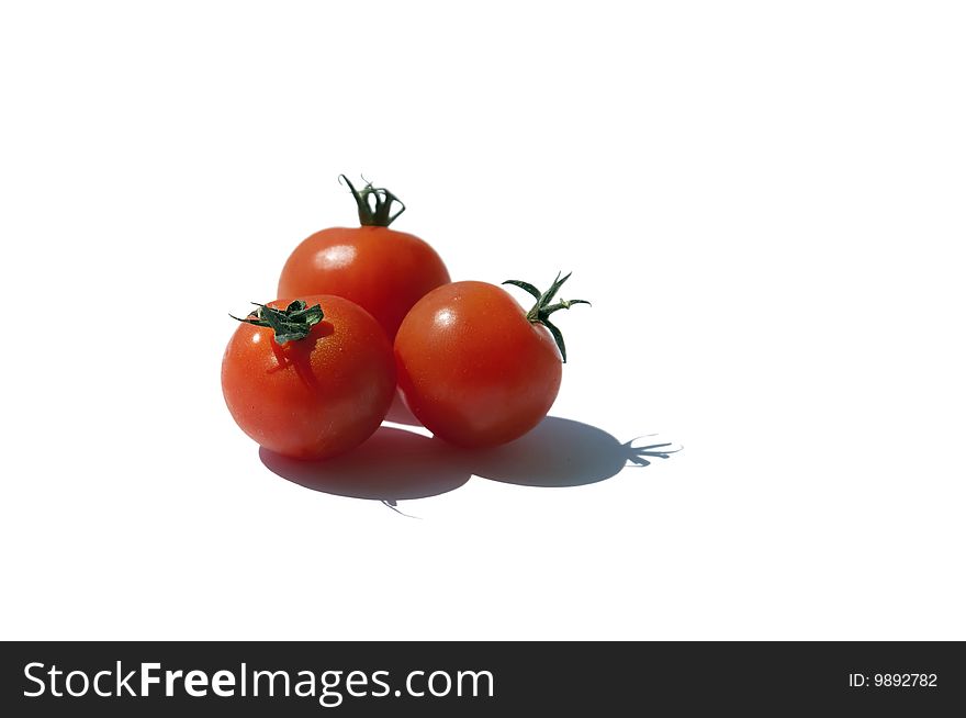 Three Tomatos isolated on a white background