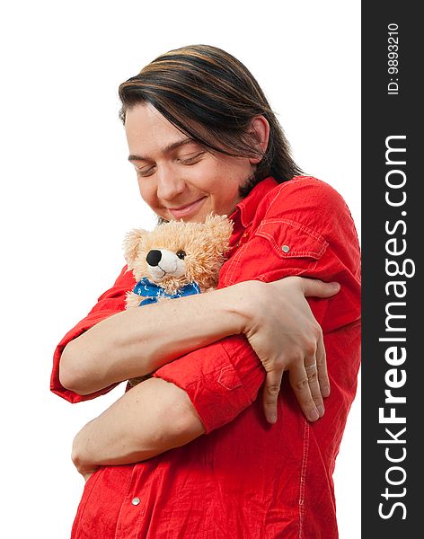 Young guy with his loved  from childhood toy - teddy bear. Isolated over white in studio. Young guy with his loved  from childhood toy - teddy bear. Isolated over white in studio.