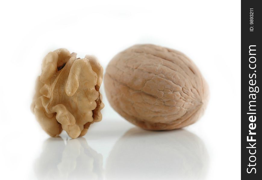 Macro of nutmeat and nuts in white background