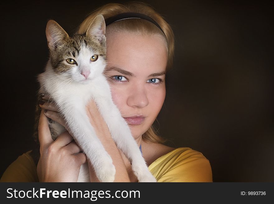 Young woman and her cute cat - portrait. Young woman and her cute cat - portrait