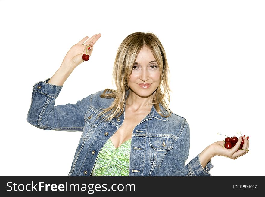 Beautiful woman with a cherry isolated on white