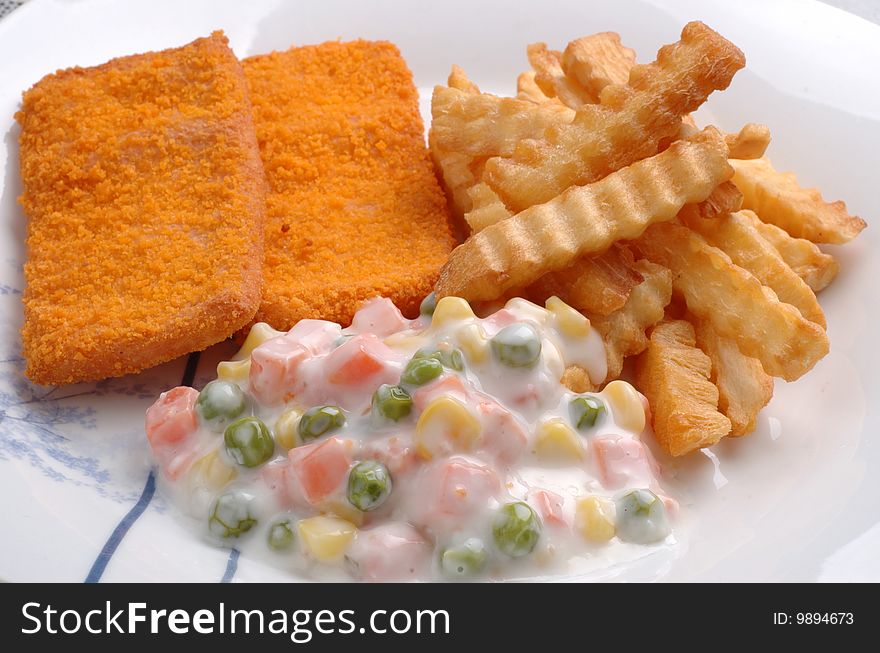 Fish and chips plate close up