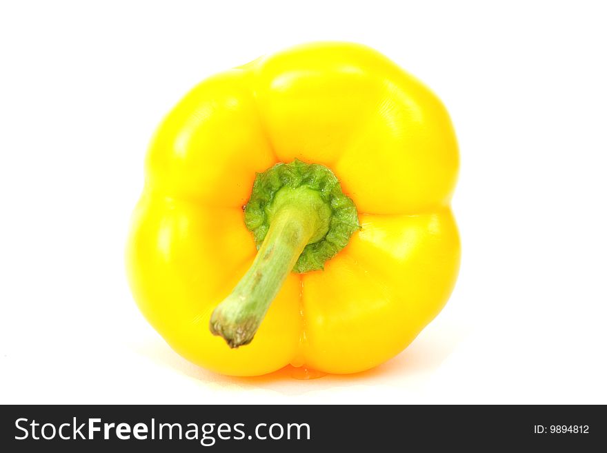 Fresh yellow paprika photographed on white background. Fresh yellow paprika photographed on white background