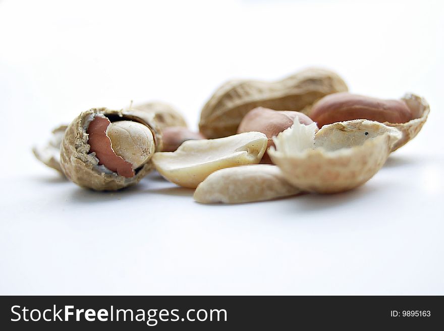 Several walnut and hazelnut on white background. Several walnut and hazelnut on white background
