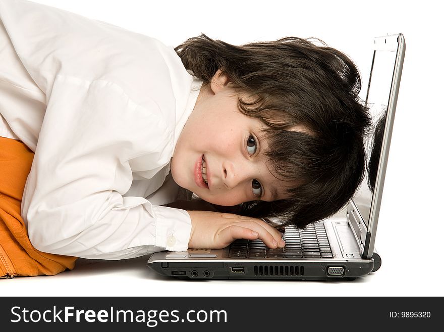 The merry  boy with laptop on white background