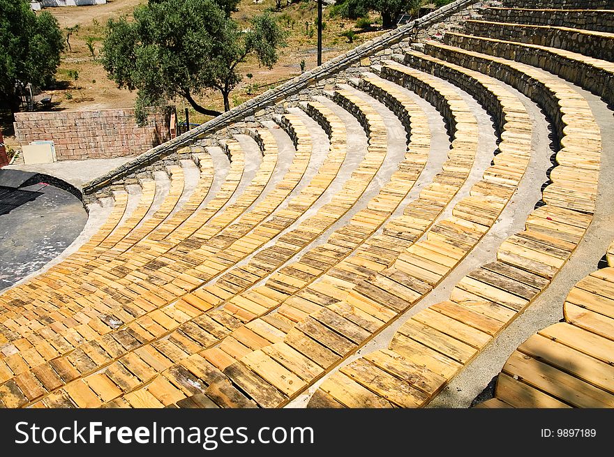 Wooden chairs of an outdoor amphitheatre