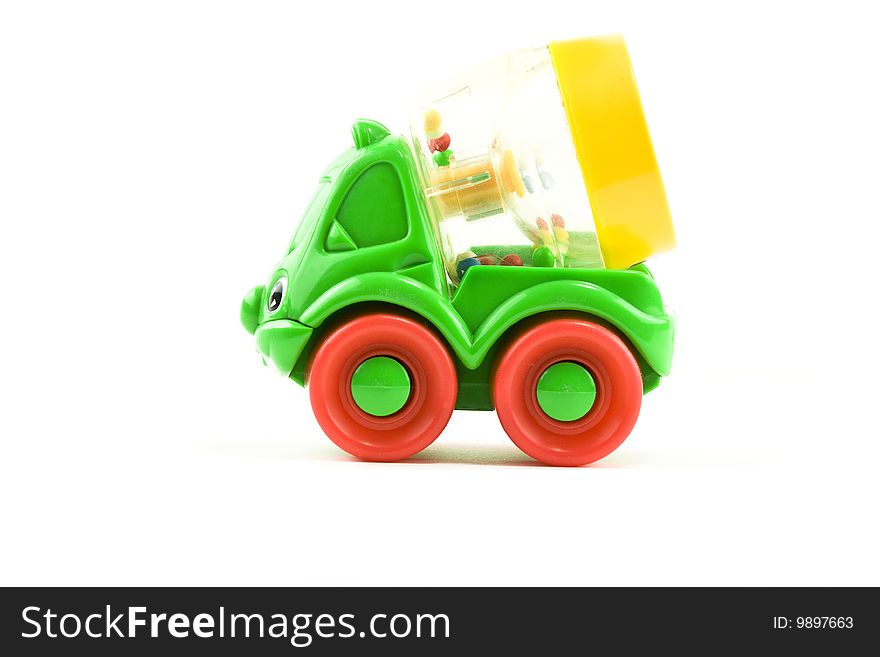 Childs toy cement mixer on white background