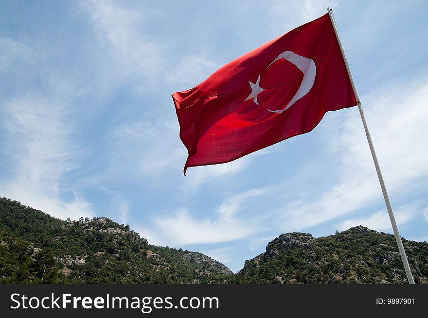 Turkish flag on flagpole. Turkey. Mediterranean Sea