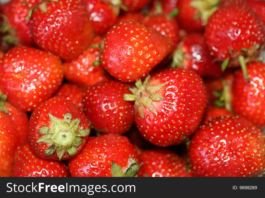 Red, fresh organic strawberries god for juice,yoghurt or salad