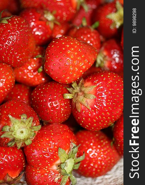 Red, fresh organic strawberries god for juice,yoghurt or salad