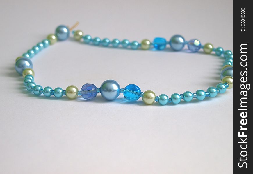 Blue pearls necklace.