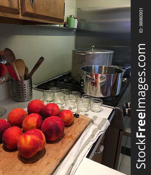 Peaches with jam jars and boiling water bath canner