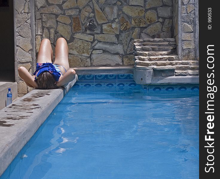 Girl chilling by the pool