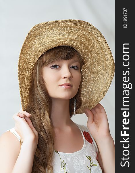 Portrait Of The Girl In A Straw Hat