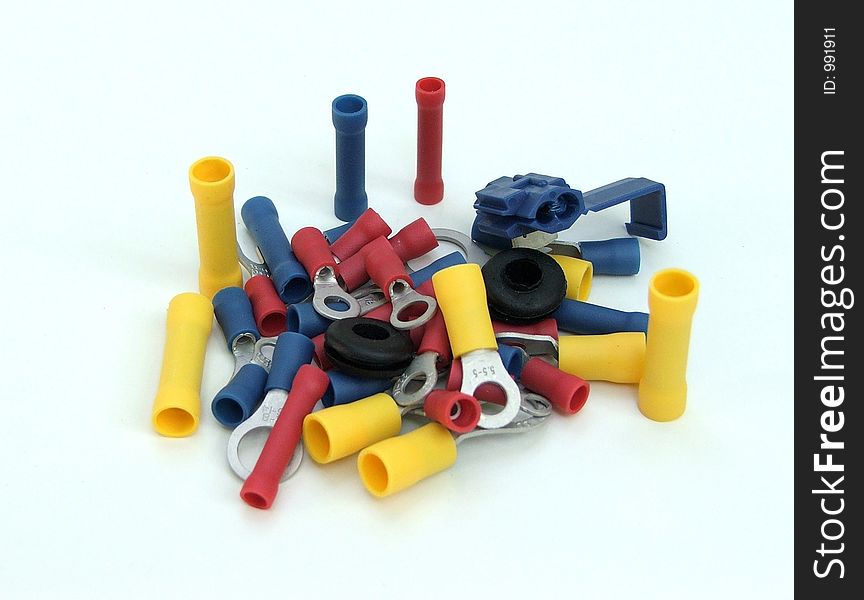 An assortment of crimp ends for electrical wires. An assortment of crimp ends for electrical wires.