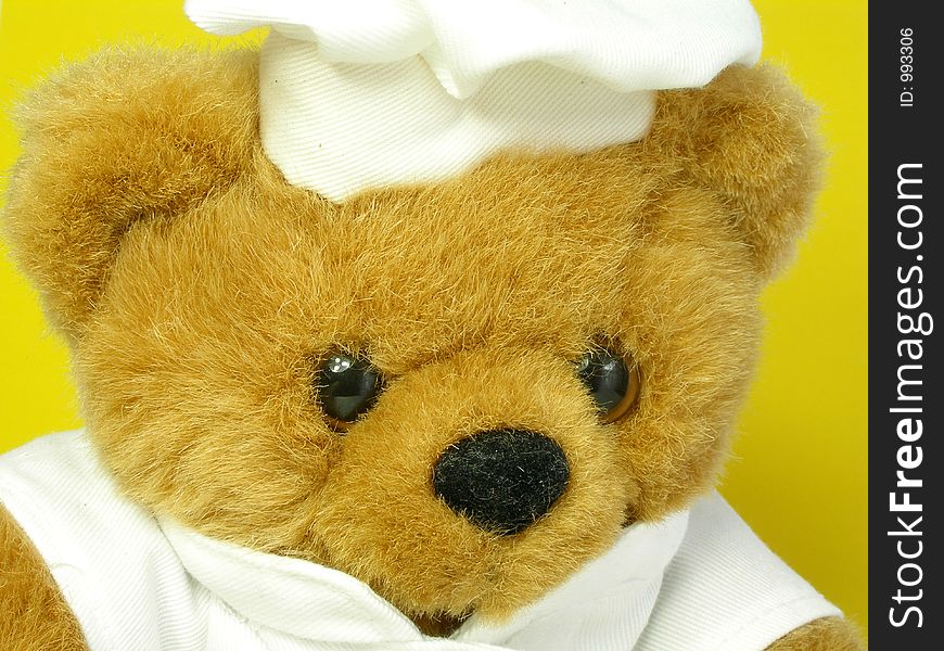 Chef Teddy bear is taking his job seriously. Chef Teddy bear is taking his job seriously