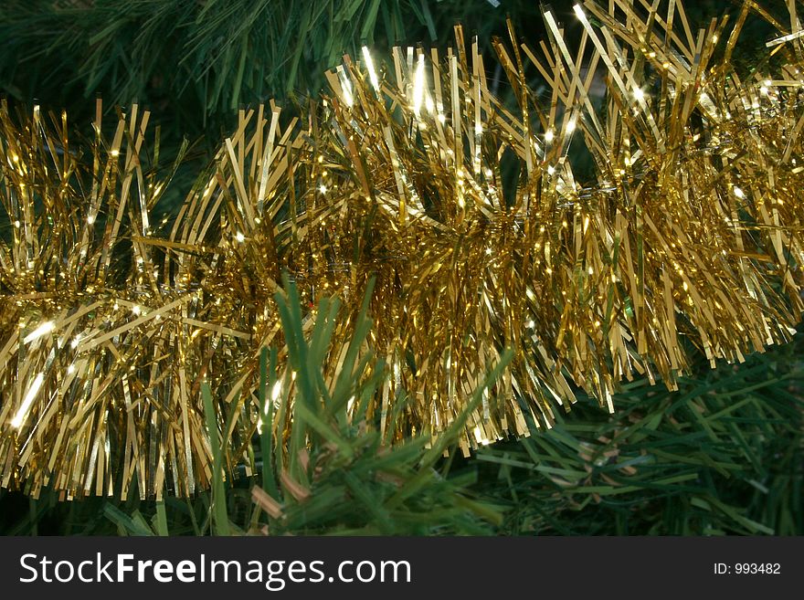 Gold garland decorates the Christmas Tree