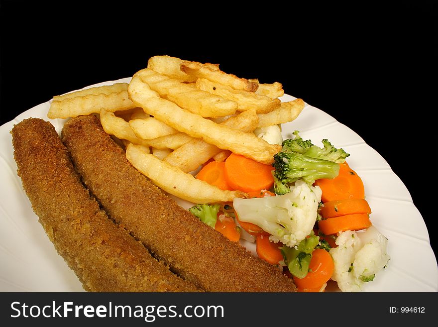 Chips Vegetables and crumbed sausages. Chips Vegetables and crumbed sausages