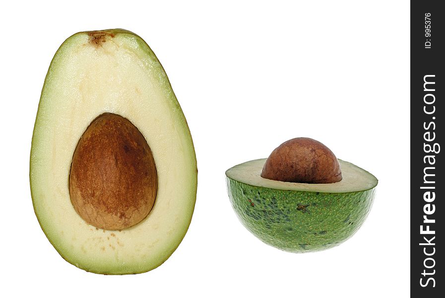 Two pieces of avocado. Isolated. Two pieces of avocado. Isolated.