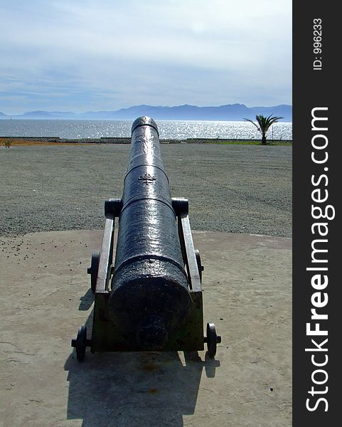 Field cannon pointed to the sea