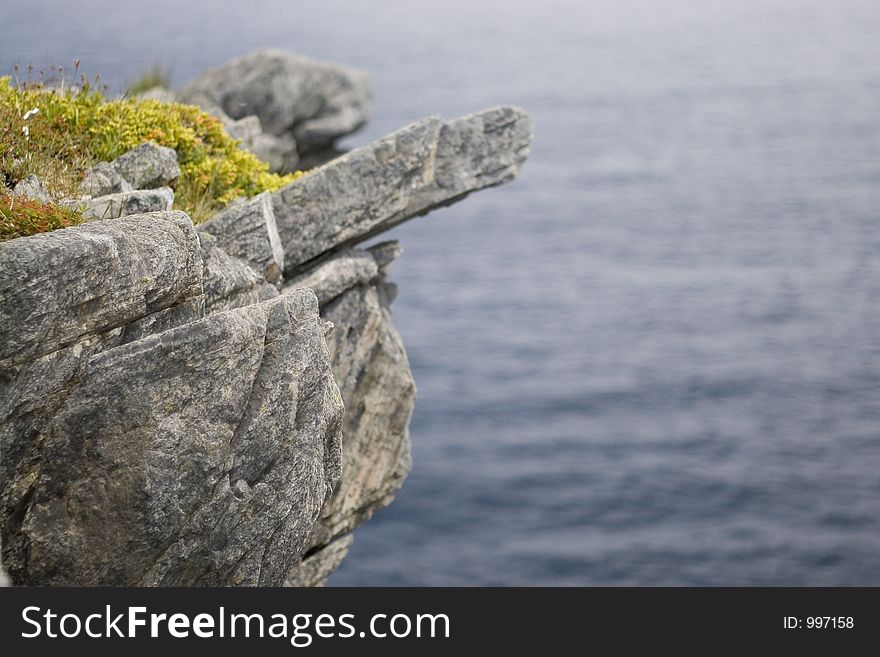 Overhang of a cliff on the atlantic, along the East Coast Trail. Overhang of a cliff on the atlantic, along the East Coast Trail.