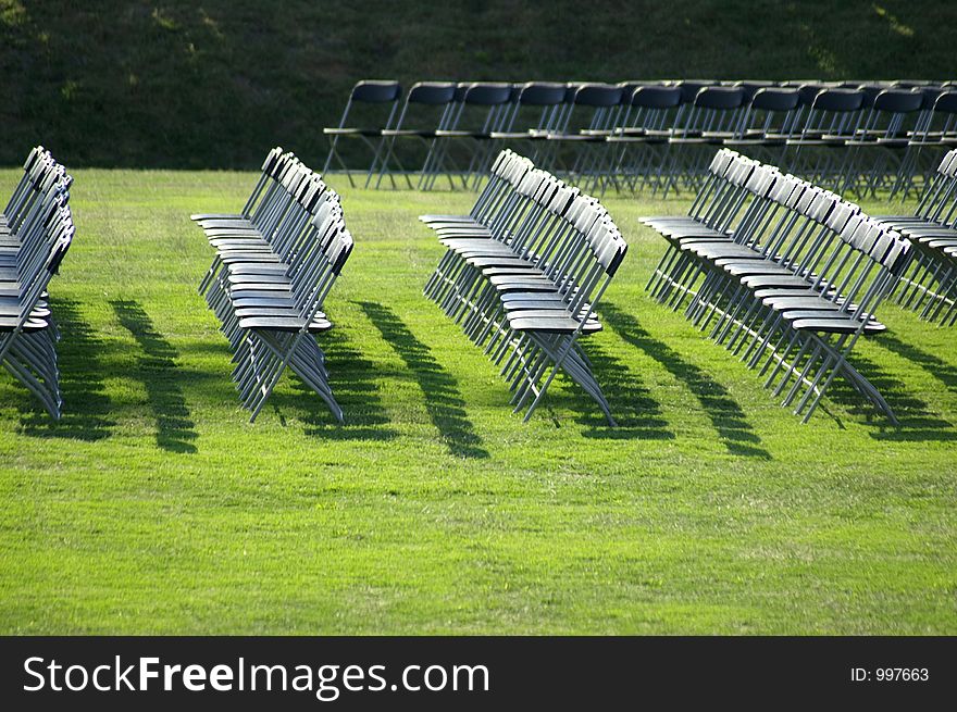 Rows of folding chairs.