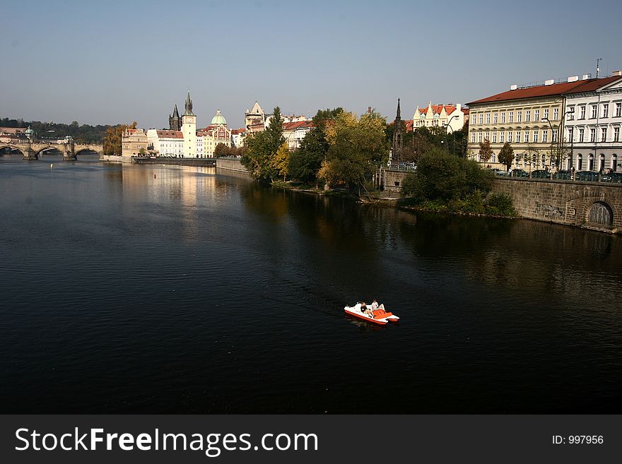 Automn in prag in tcheck republic, houses and buildings, view on the river from the bridge