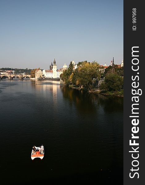 Automn in prag in tcheck republic, houses and buildings, view on the river from the bridge