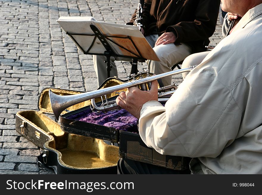 Automn in prag in tcheck republic, houses and buildings, musician in a street